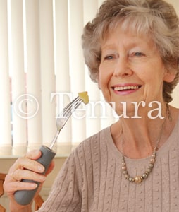 Adult Cutlery Grips Used by Woman Eating
