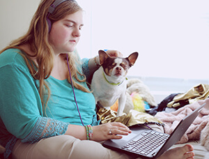 Autistic woman using the computer