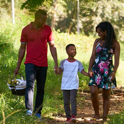 Family on a walk in the sun