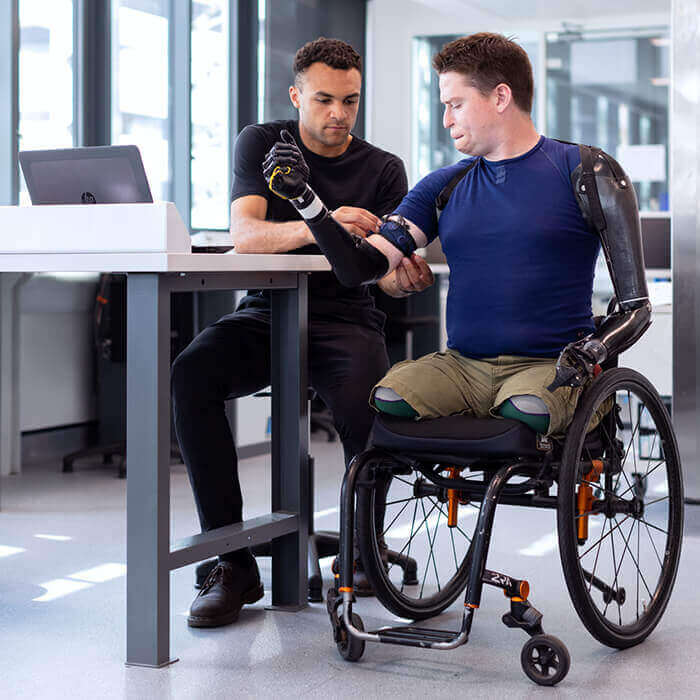 Disabled Person in Wheelchair at Work
