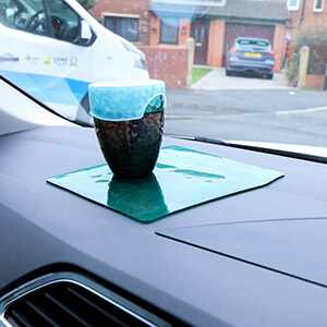 Using an Extreme mat in the Car as a Drinks Holder