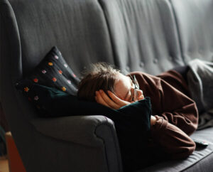 Girl Sleeping on Couch 