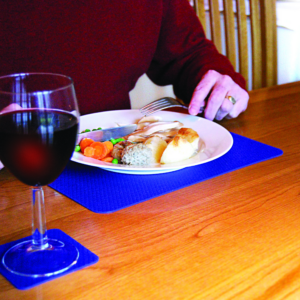 Person Eating at The Dining Table with Tenura Products
