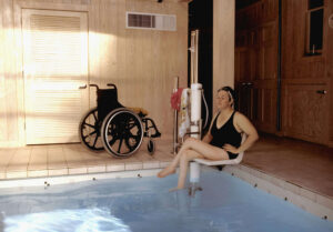 Women wheelchair user at the swimming pool
