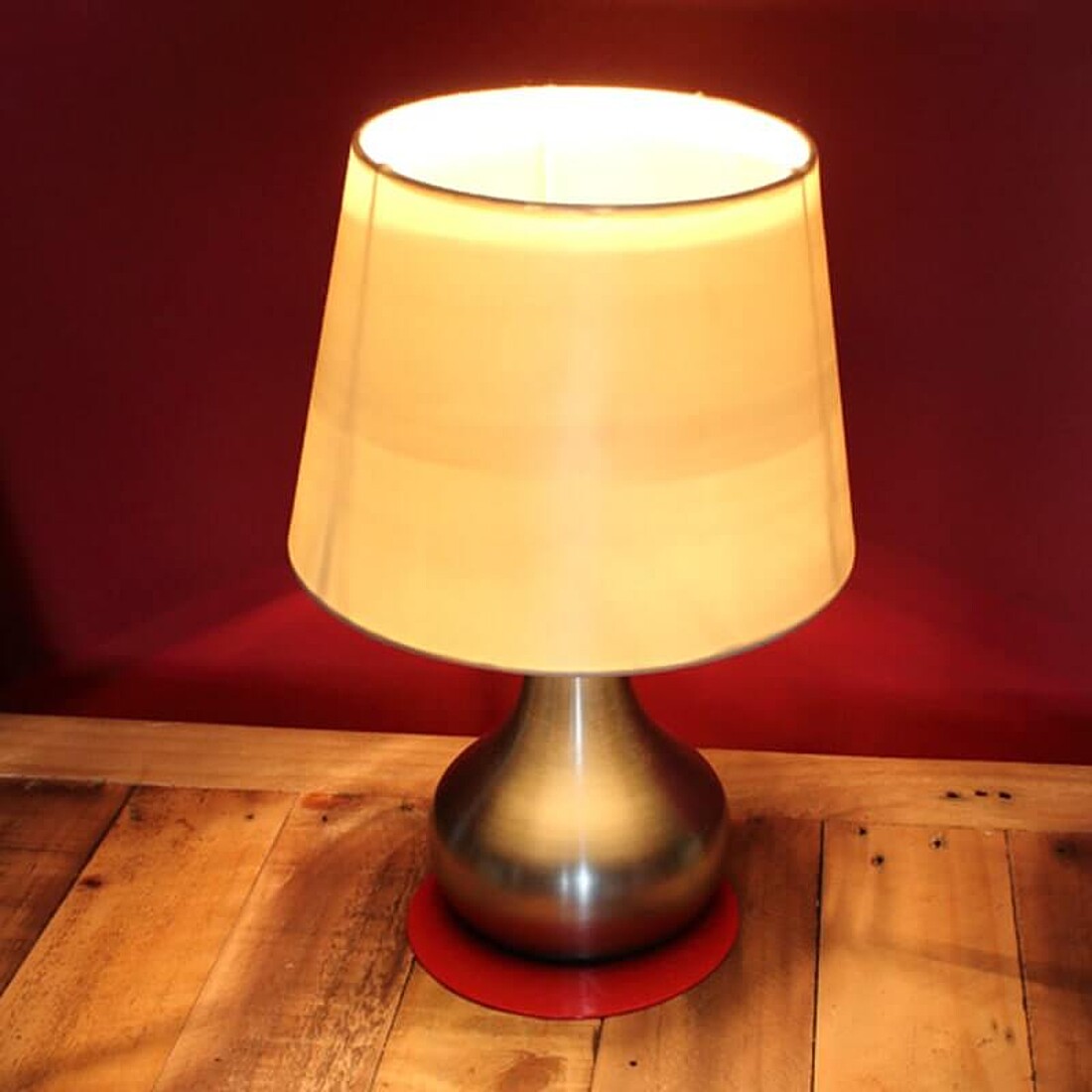 tc-19-1-red-circular-anti-slip-coaster-application-under-lamp-table-background