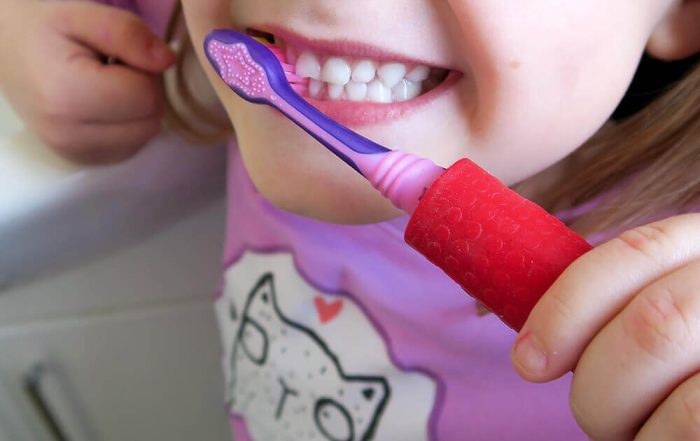 T-PCG-R-Red-Childrens-Cutlery-Grips-Girl-Brushing Teeth-2