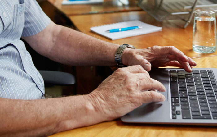 Old Gentleman Watching Tenura Videos on the Tenura Website
