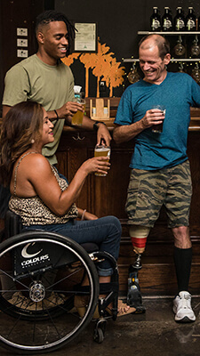 Disabled People at a Bar With Friends Having Fun