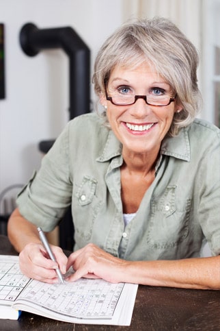 Elderly Woman Doing Puzzles