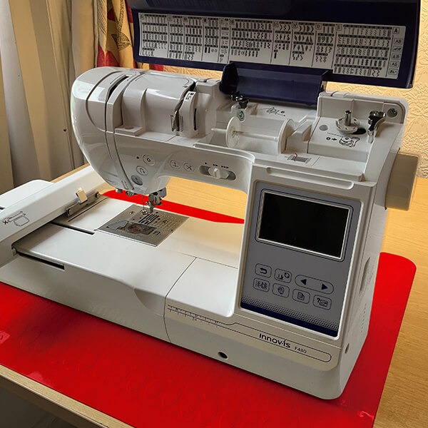 Sewing Machine on Floor Mat