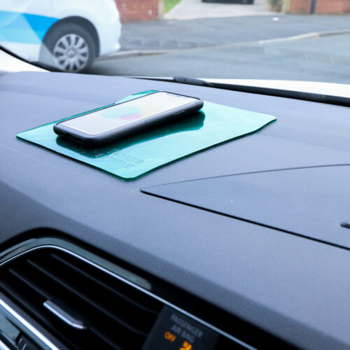 T-EG-2 Green Extreme Mat Used as a Phone Holder in a Car-5.jpeg