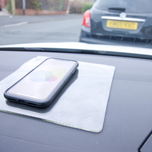 T-EG-1 Clear Extreme Mat Used as a Phone Holder in a Car-3