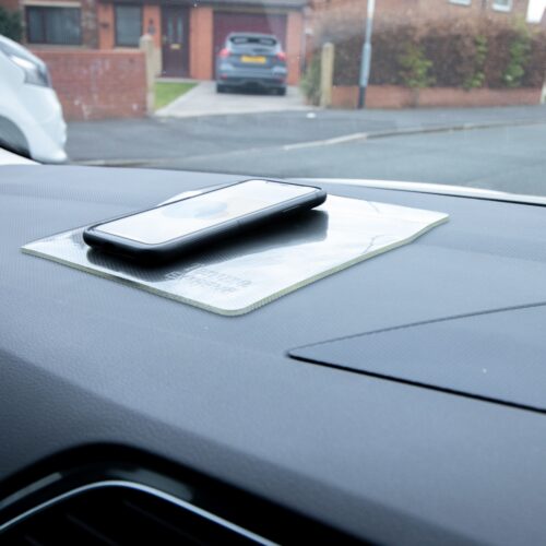 T-EG-1 Clear Extreme Mat Used as a Phone Holder in a Car-6