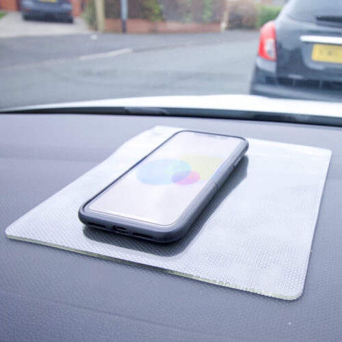 T-EG-1 Clear Extreme Mat Used as a Phone Holder in a Car-3