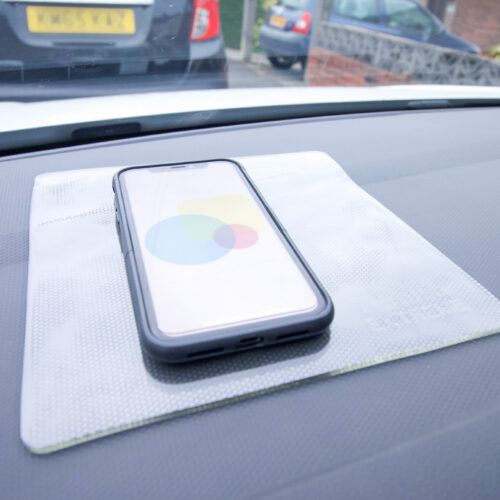 T-EG-1 Clear Extreme Mat Used as a Phone Holder in a Car-5