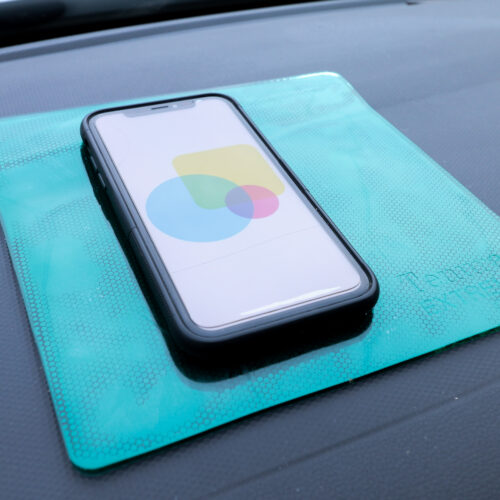 T-EG-2 Green Extreme Mat Used as a Phone Holder in a Car-1