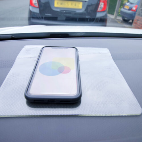 T-EG-1 Clear Extreme Mat Used as a Phone Holder in a Car-4